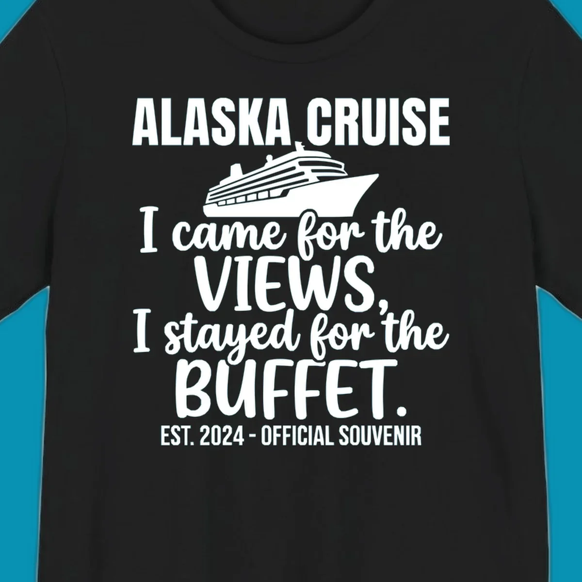 Gray t-shirt design with white cruise ship illustration and text reading 'I came for the views, I stayed for the buffet' — a funny Alaska cruise souvenir design
