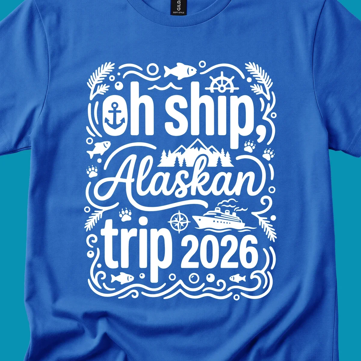 White ornamental design on gray featuring "Oh Ship, Alaskan trip 2026" text with nautical and wilderness icons including cruise ship, anchor, mountains, and evergreen trees.