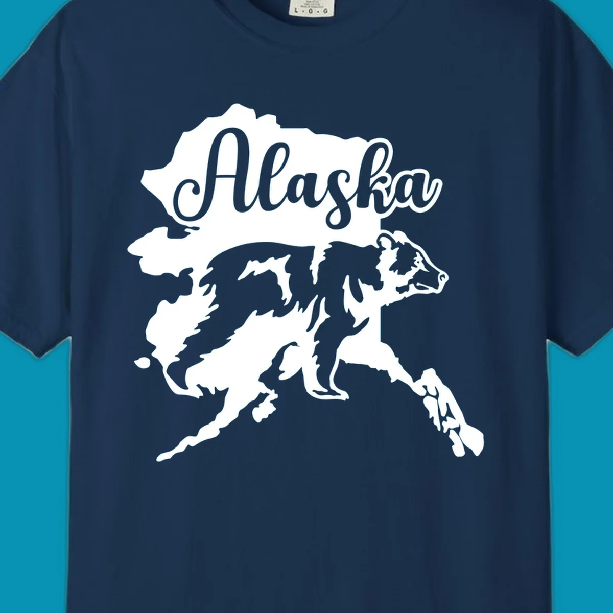 Alaska state map with bear silhouette and 'Alaska' text in elegant script lettering on gray background
