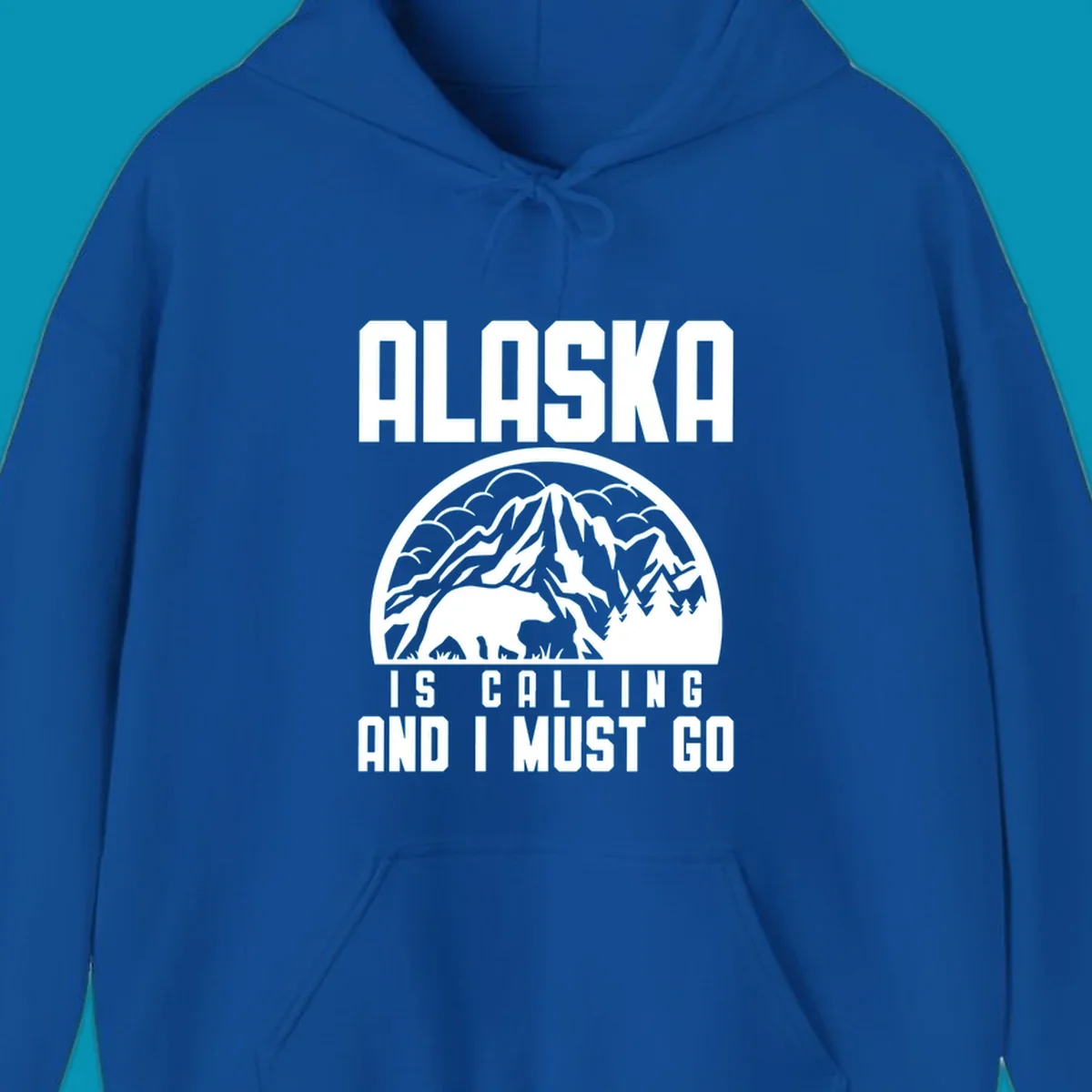 Vintage badge design with 'Alaska Is Calling And I Must Go' text, featuring mountain peak, bear, and evergreen trees