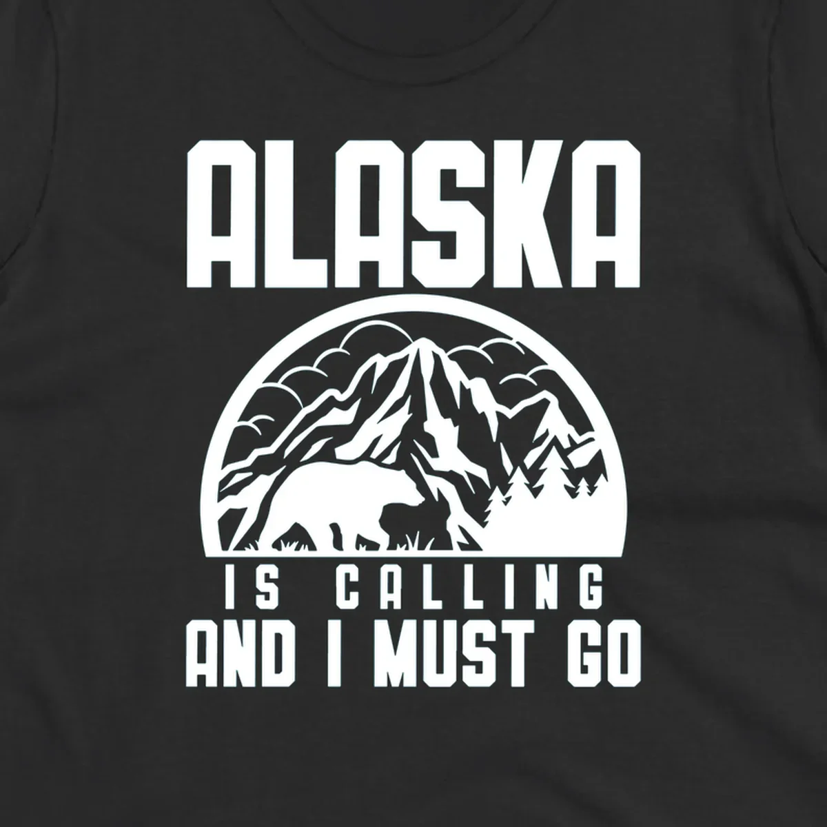 Vintage badge design with 'Alaska Is Calling And I Must Go' text, featuring mountain peak, bear, and evergreen trees
