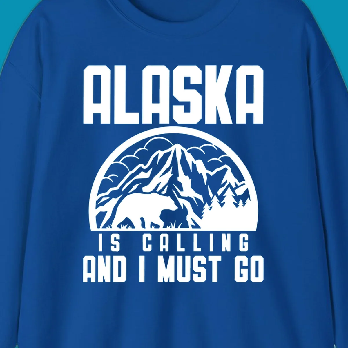 Vintage badge design with 'Alaska Is Calling And I Must Go' text, featuring mountain peak, bear, and evergreen trees