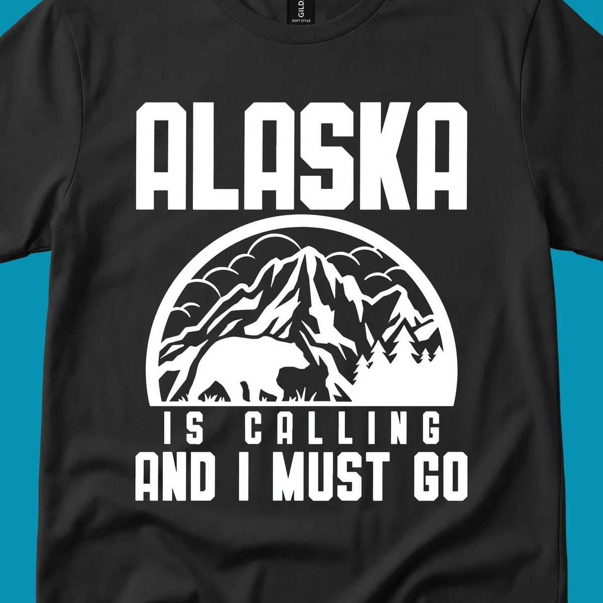 Vintage badge design with 'Alaska Is Calling And I Must Go' text, featuring mountain peak, bear, and evergreen trees