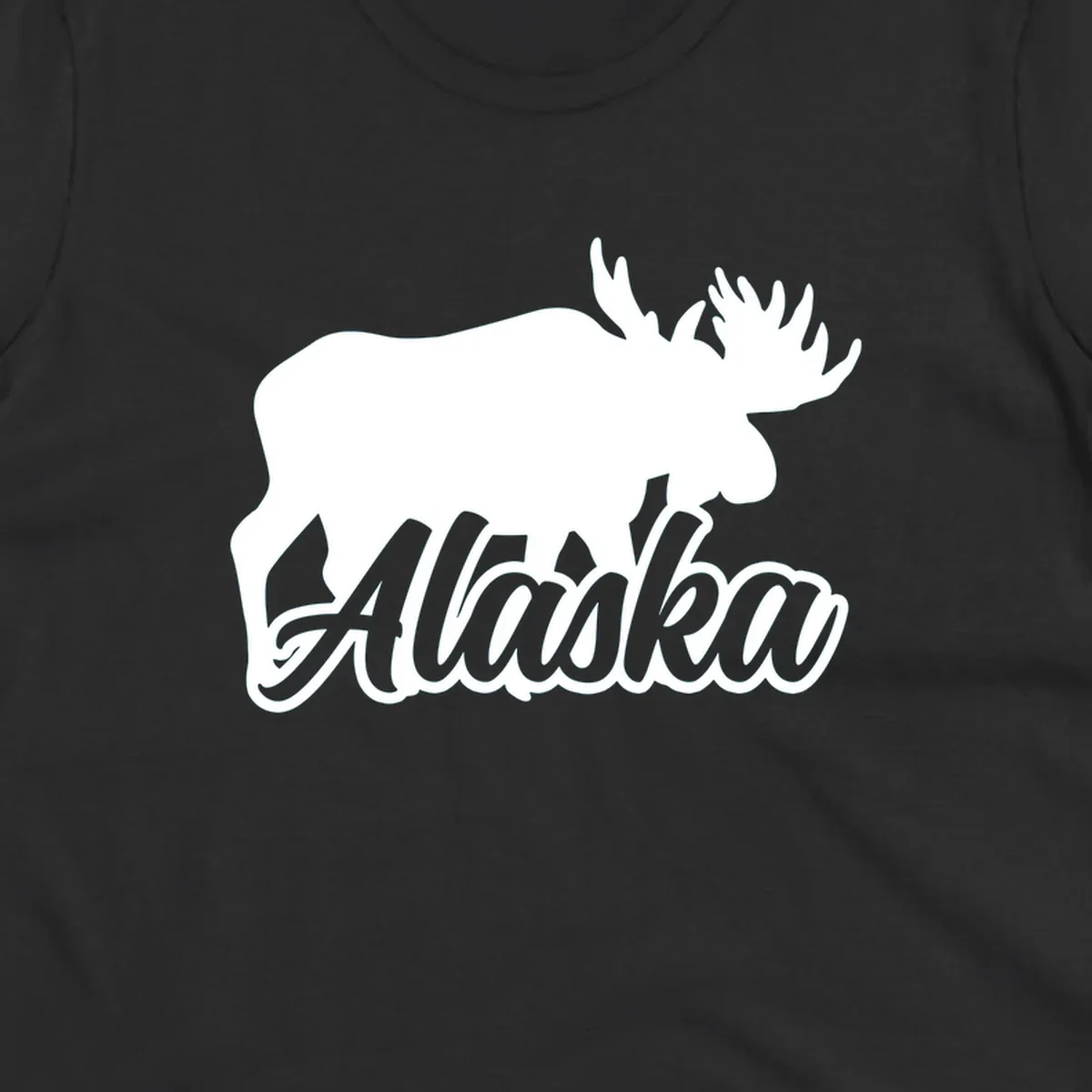 White moose silhouette with branching antlers above stylized 'Alaska' text in gray lettering on gray background