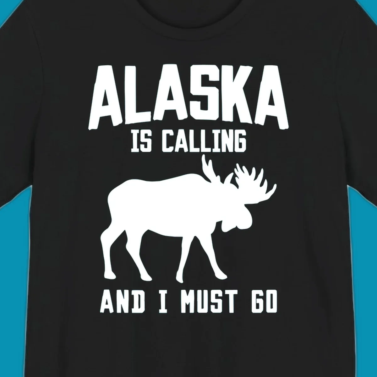 White moose silhouette with text 'Alaska Is Calling And I Must Go' on gray background—Alaska is calling moose design