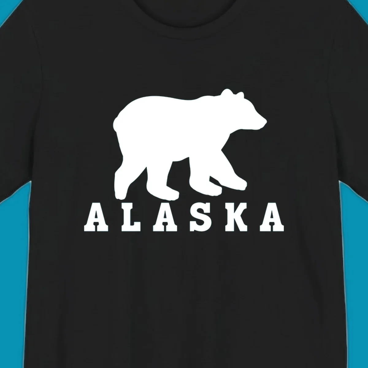 White bear silhouette standing with front paws visible, Alaska text below with pine tree accents on gray background