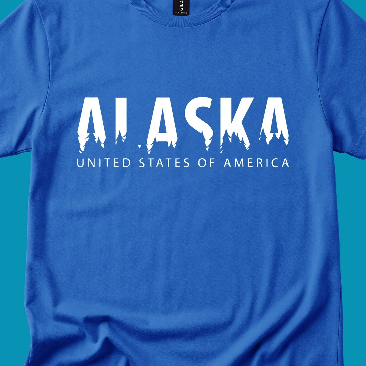Alaska pine forest map design featuring white letters with integrated tree silhouettes and "United States of America" text on gray background