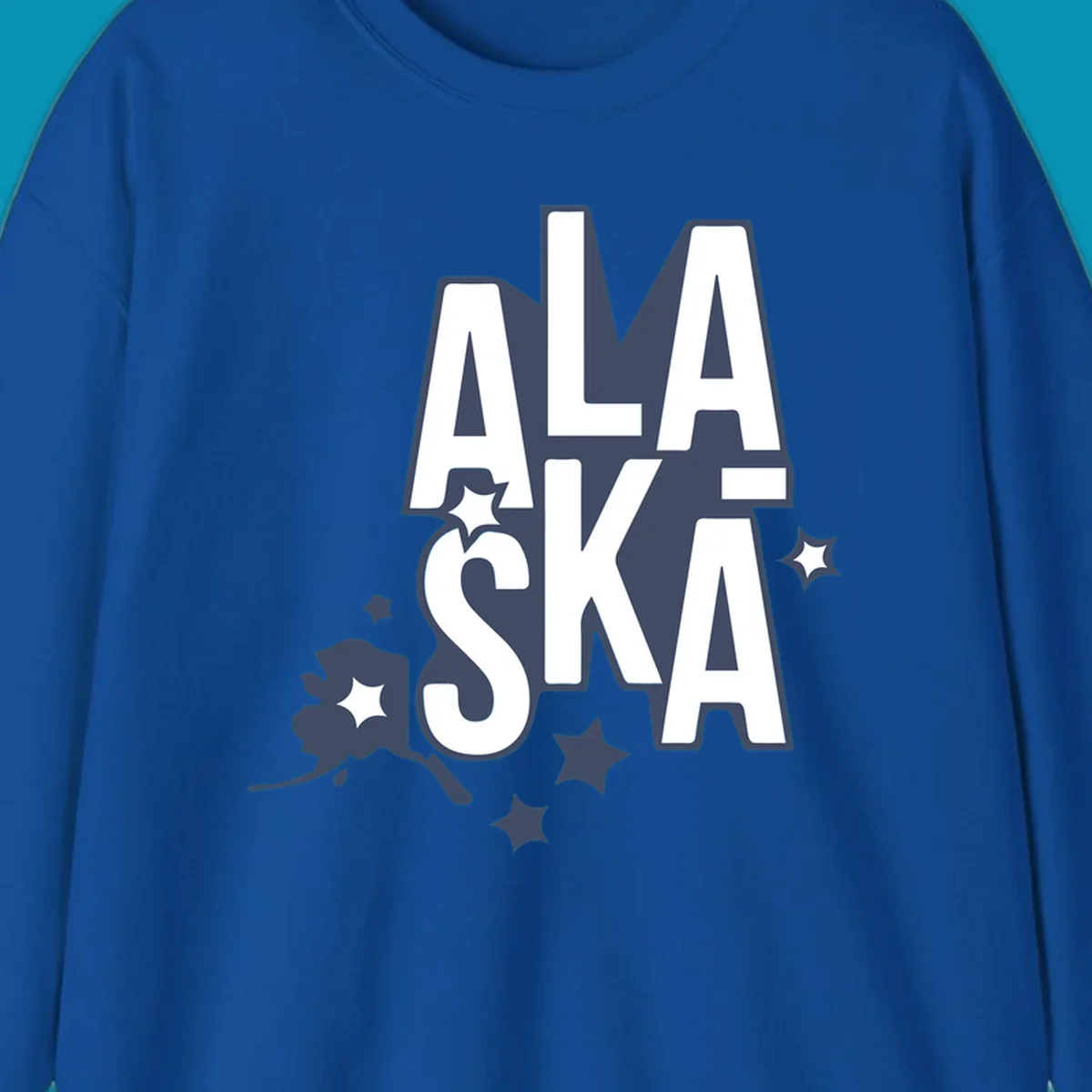 Alaska adventure lettering design with bold outlined text, decorative stars, and botanical accents in navy and white