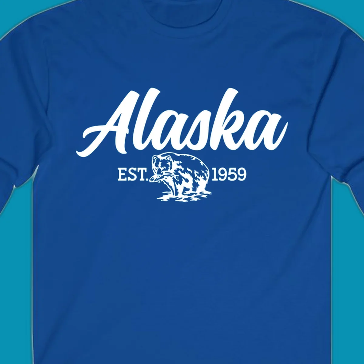 Vintage-style alaskan bear badge design with script lettering and established 1959 date on gray background