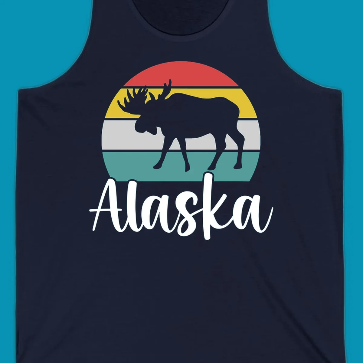 White moose silhouette against red, gold, gray, and teal horizontal stripes in a circular badge design representing Alaska mountains and wildlife.