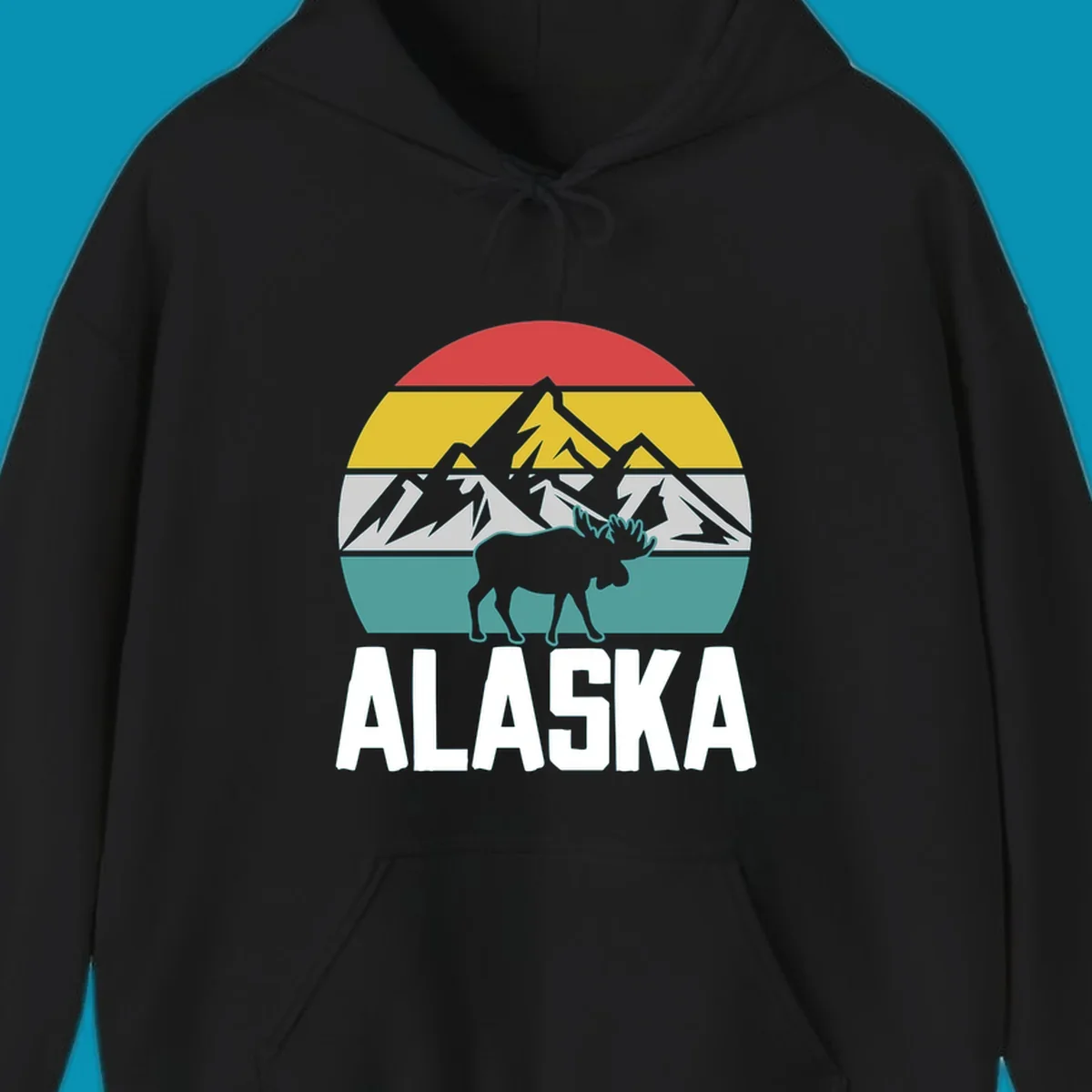 Moose mountain Alaska badge with white moose silhouette, snow peaks, and horizontal landscape stripes in red, gold, gray, and teal.