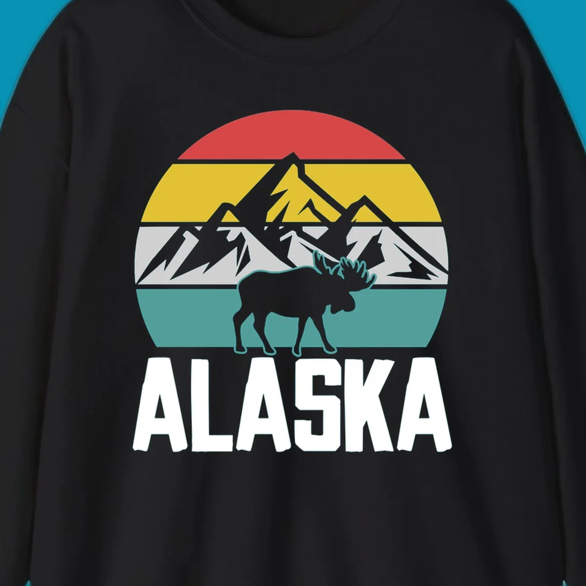 Moose mountain Alaska badge with white moose silhouette, snow peaks, and horizontal landscape stripes in red, gold, gray, and teal.