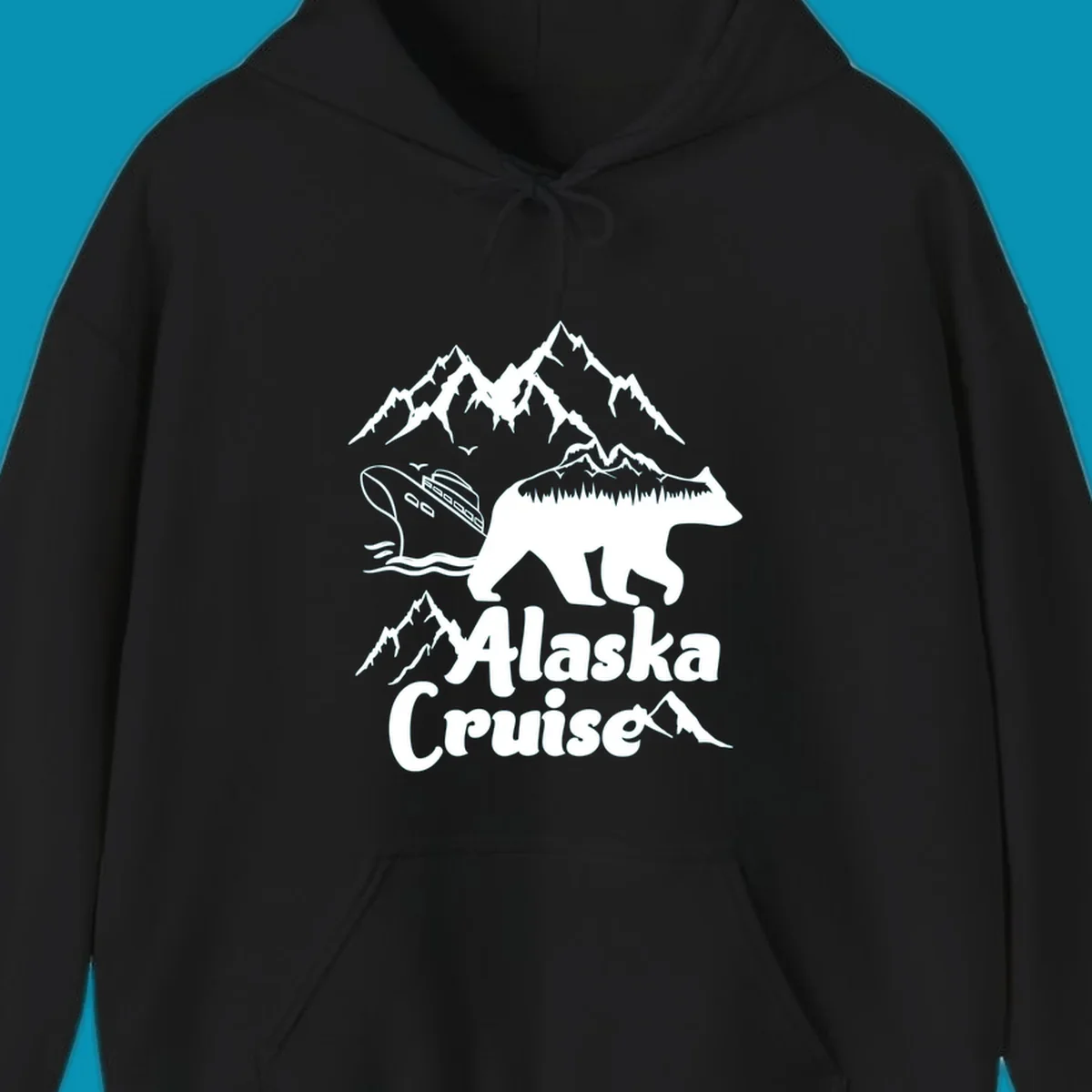 White silhouette of polar bear filled with Alaskan mountains, forest, cabin, and ship against gray background with snowy peaks and 'Alaska Cruise' text