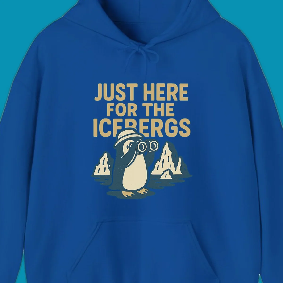 Vintage-style penguin explorer with binoculars among icebergs and 'Just Here For The Icebergs' text, Alaska cruise design