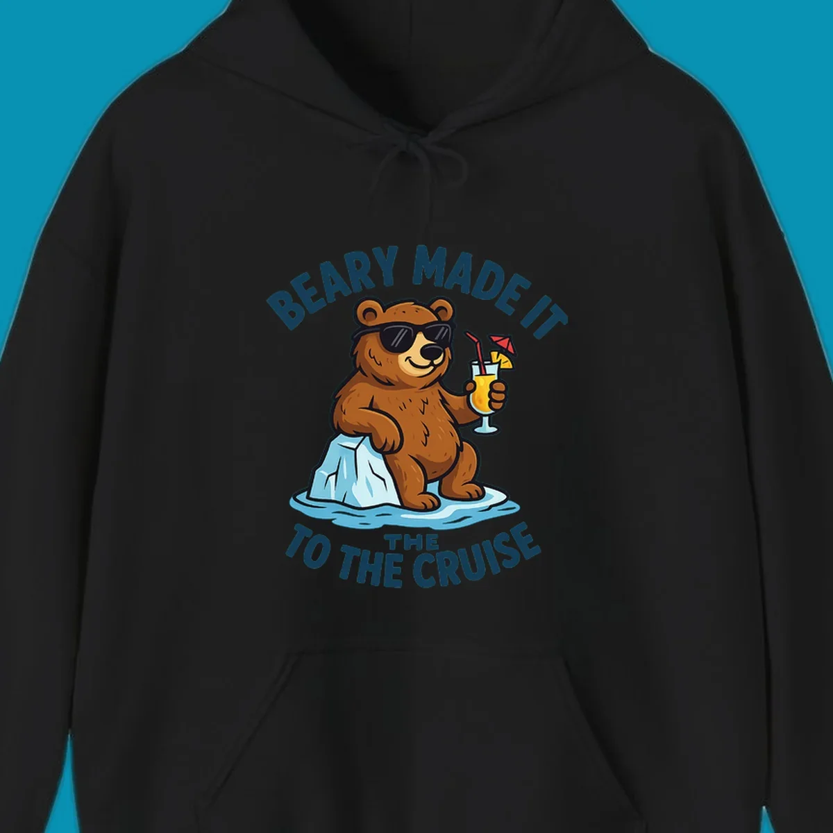 Brown bear wearing sunglasses on ice floe holding tropical drink with text 'Beary Made It To The Cruise'