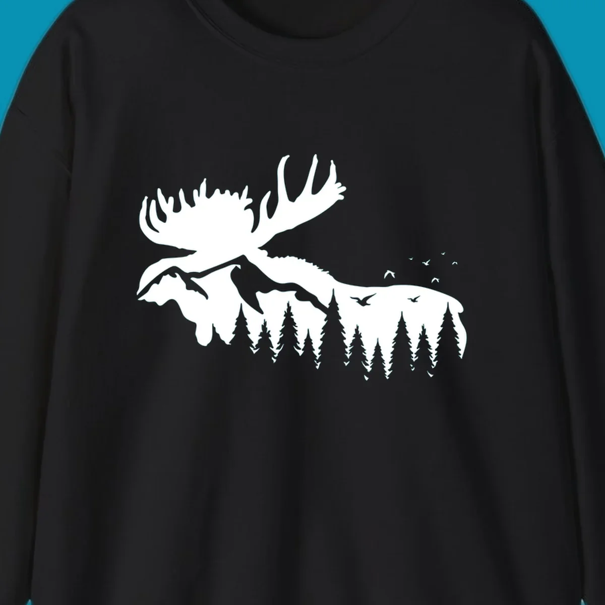 White silhouette of a moose with large antlers integrated into a forested mountain landscape with evergreen trees and flying birds against gray background.