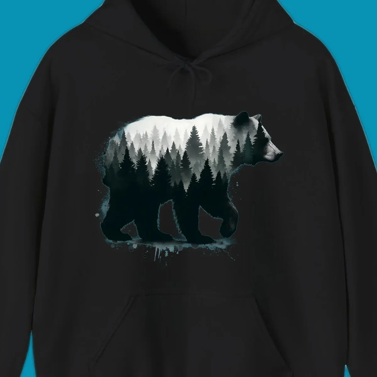Bear forest double exposure design: black bear silhouette filled with misty coniferous forest and mountains, artistic ink splatter effect