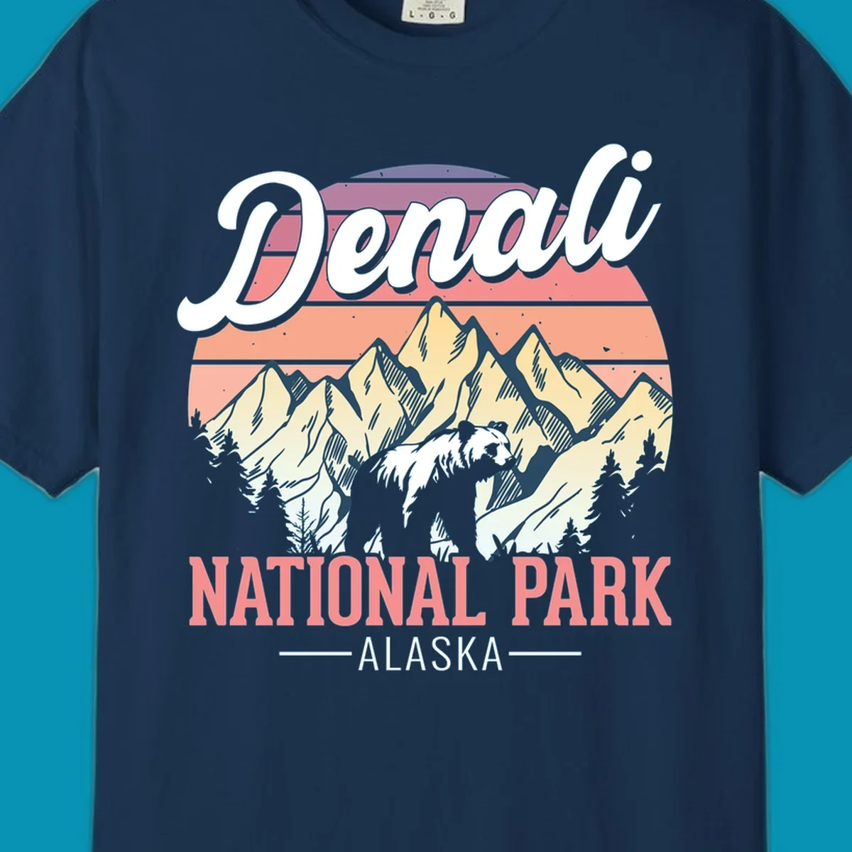Retro vintage illustration of Denali National Park with snow-capped mountain peaks against a warm coral and peach sunset gradient background with text.
