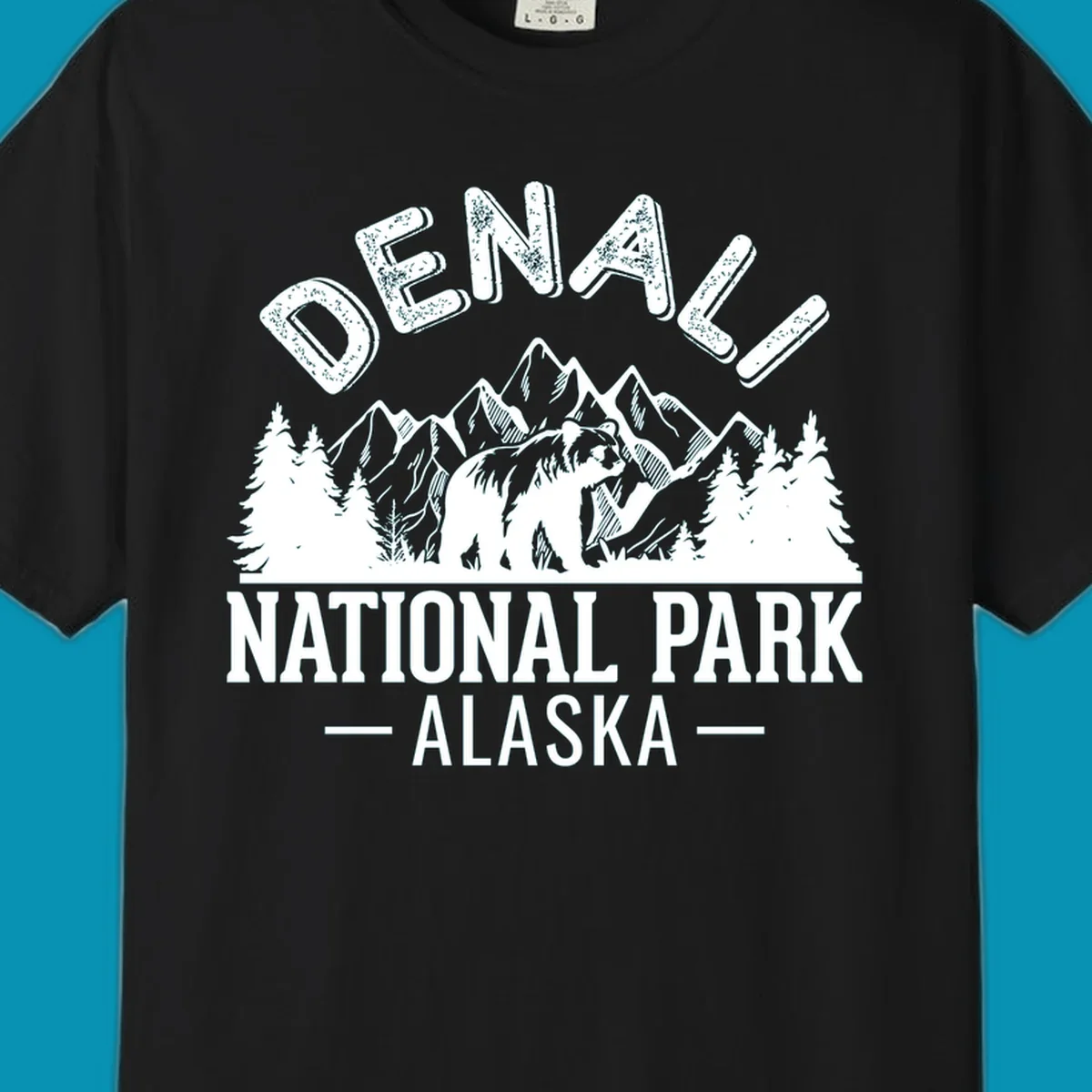 Denali National Park bear design with mountains, evergreen trees, and distressed white text on gray background