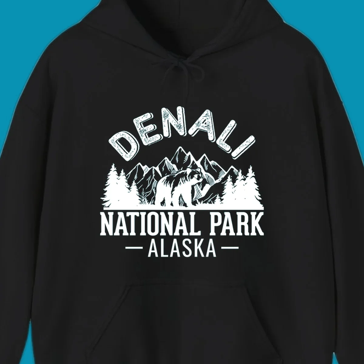 Denali National Park bear design with mountains, evergreen trees, and distressed white text on gray background