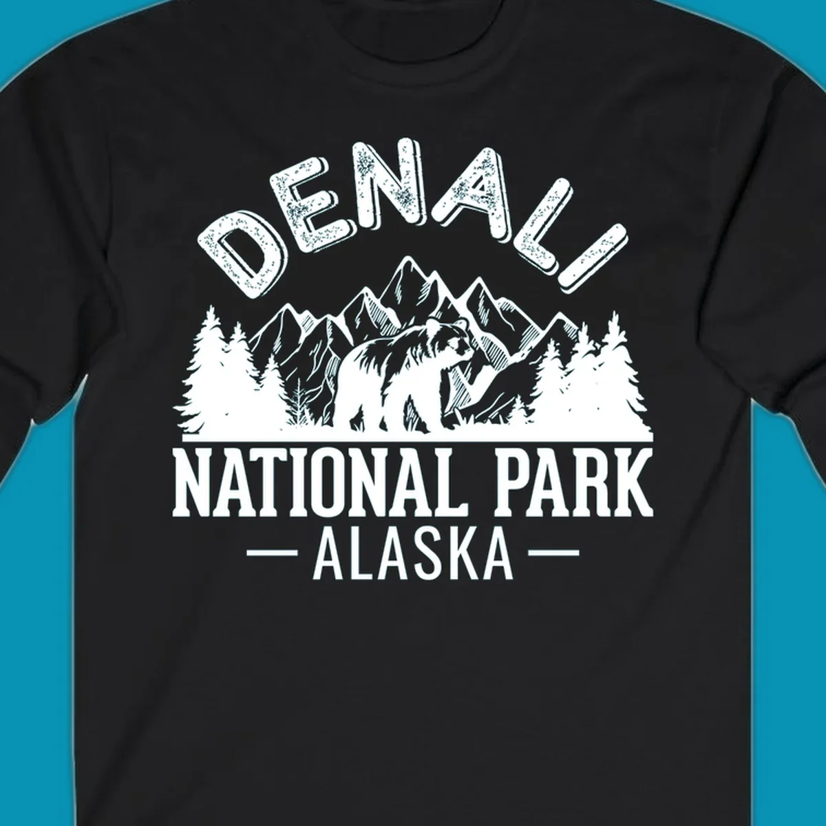 Denali National Park bear design with mountains, evergreen trees, and distressed white text on gray background