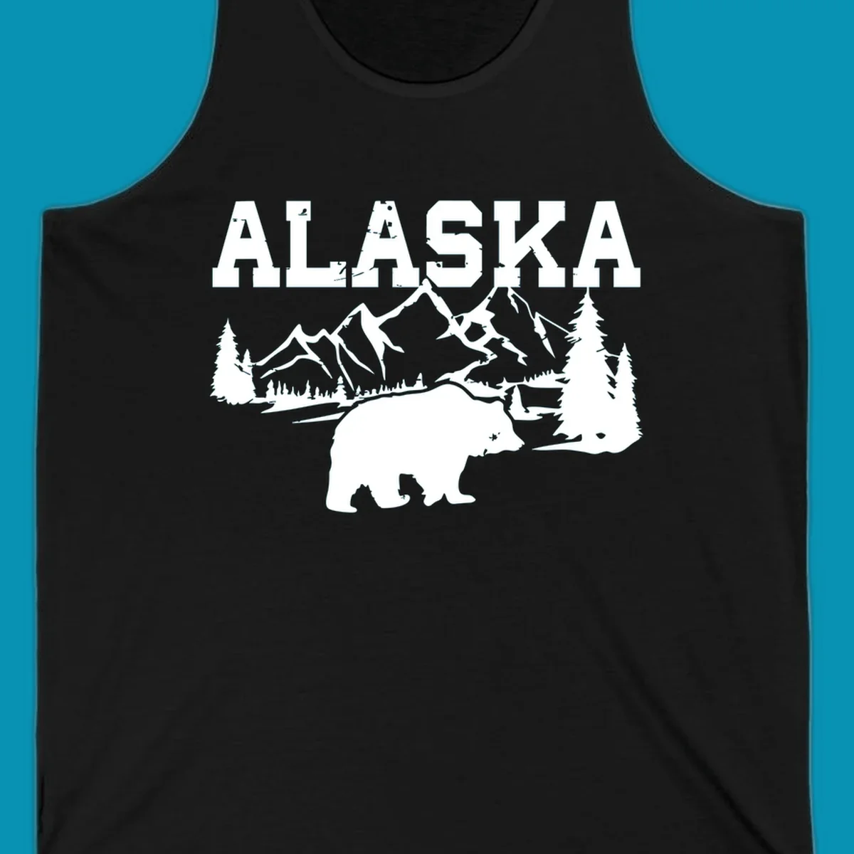 White silhouette illustration of a bear with mountains, evergreen trees, and river landscape under Alaska text on gray background