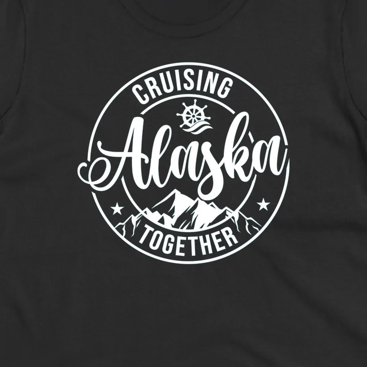 Circular badge with 'Cruising Ashore Together' text, ship wheel, and mountain design in white on gray background