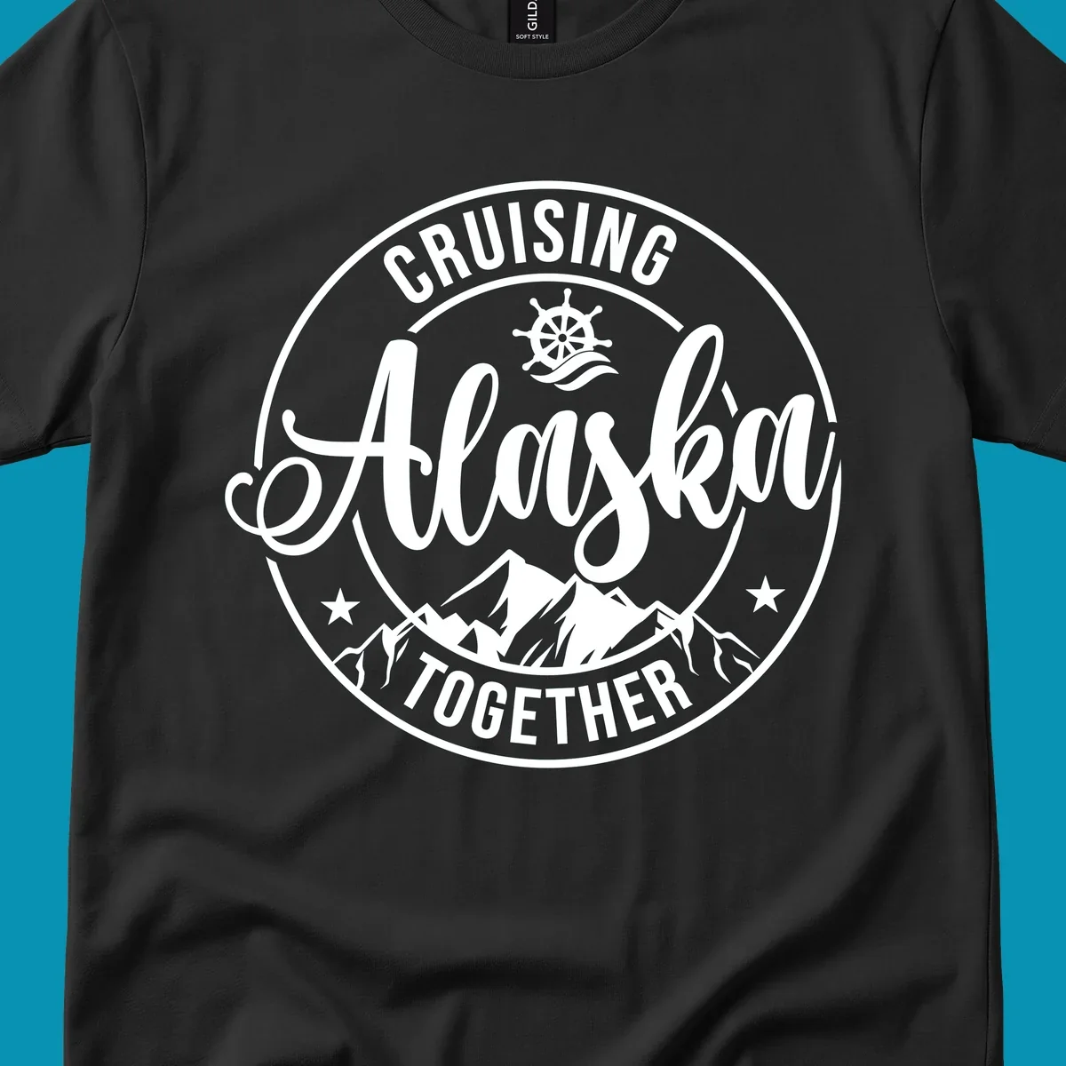 Circular badge with 'Cruising Ashore Together' text, ship wheel, and mountain design in white on gray background