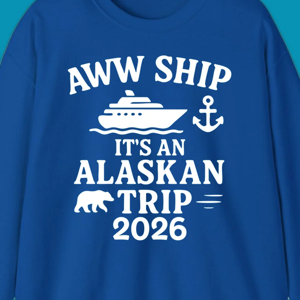 Gray design with white text reading 'Aww Ship It's An Alaskan Trip 2026' featuring a cruise ship, anchor, bear silhouette, and ocean waves