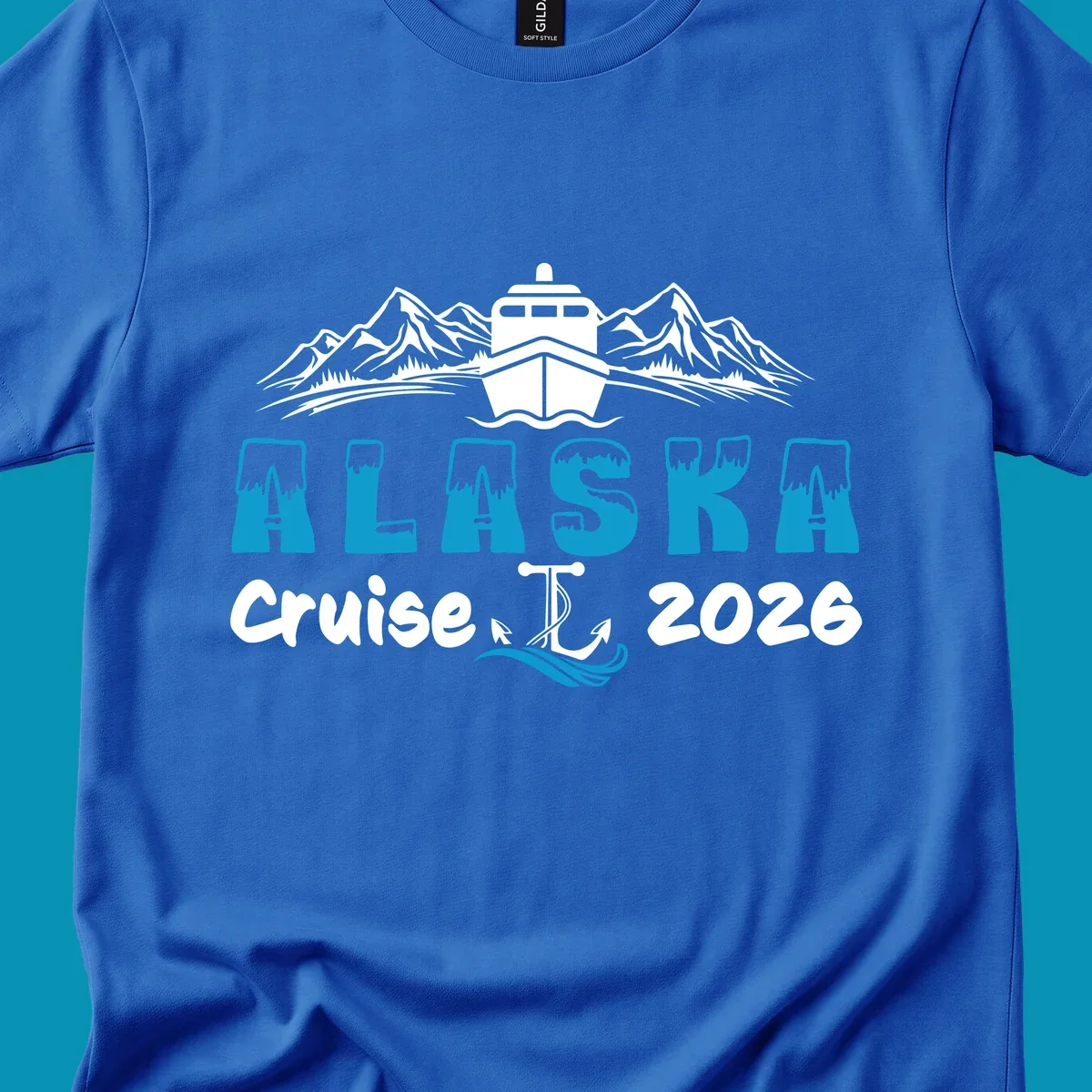 Alaska snow peak lettering design with frosted, icy-topped letters and decorative wave element in blue and white.