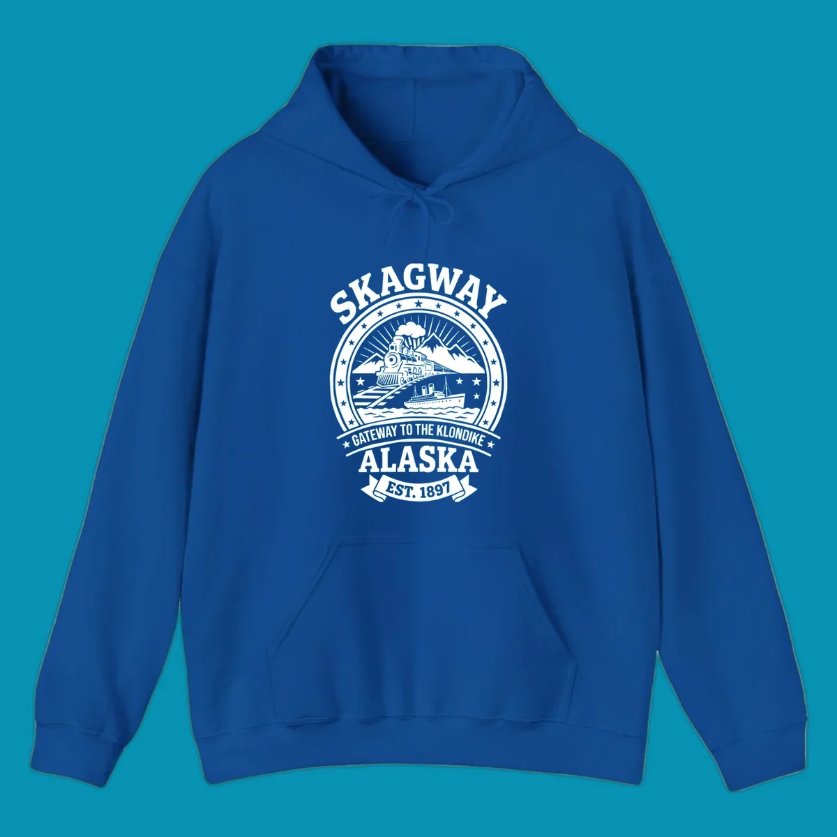 Vintage circular badge design featuring Skagway Klondike Gold Rush imagery with steam locomotive, mountains, steamship, and 1897 establishment date