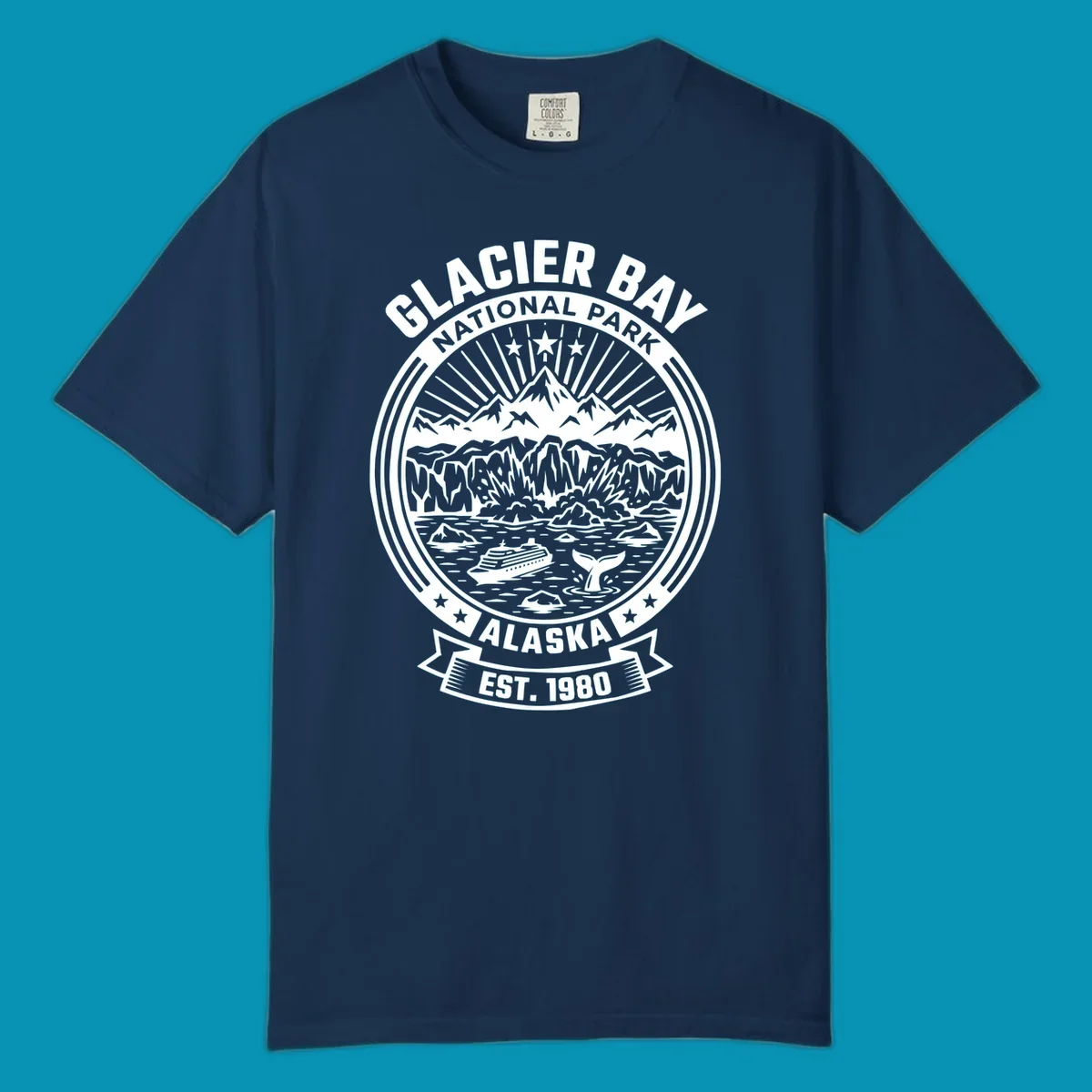 Glacier Bay National Park circular badge with mountains, cruise ship, whale tail, and icebergs, established 1980