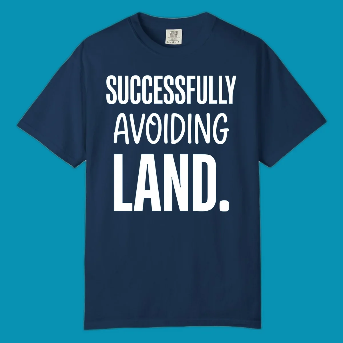 White text on gray background reading 'SUCCESSFULLY AVOIDING LAND.' - a funny cruise ship design