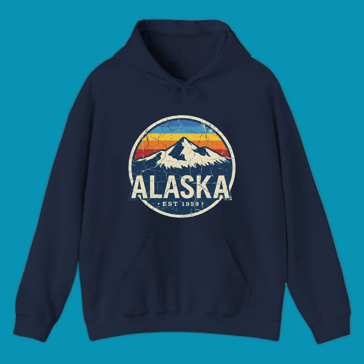Vintage circular badge with snow-capped Alaska mountain, retro rainbow stripes, and distressed cream border featuring 'ALASKA EST 1959' text