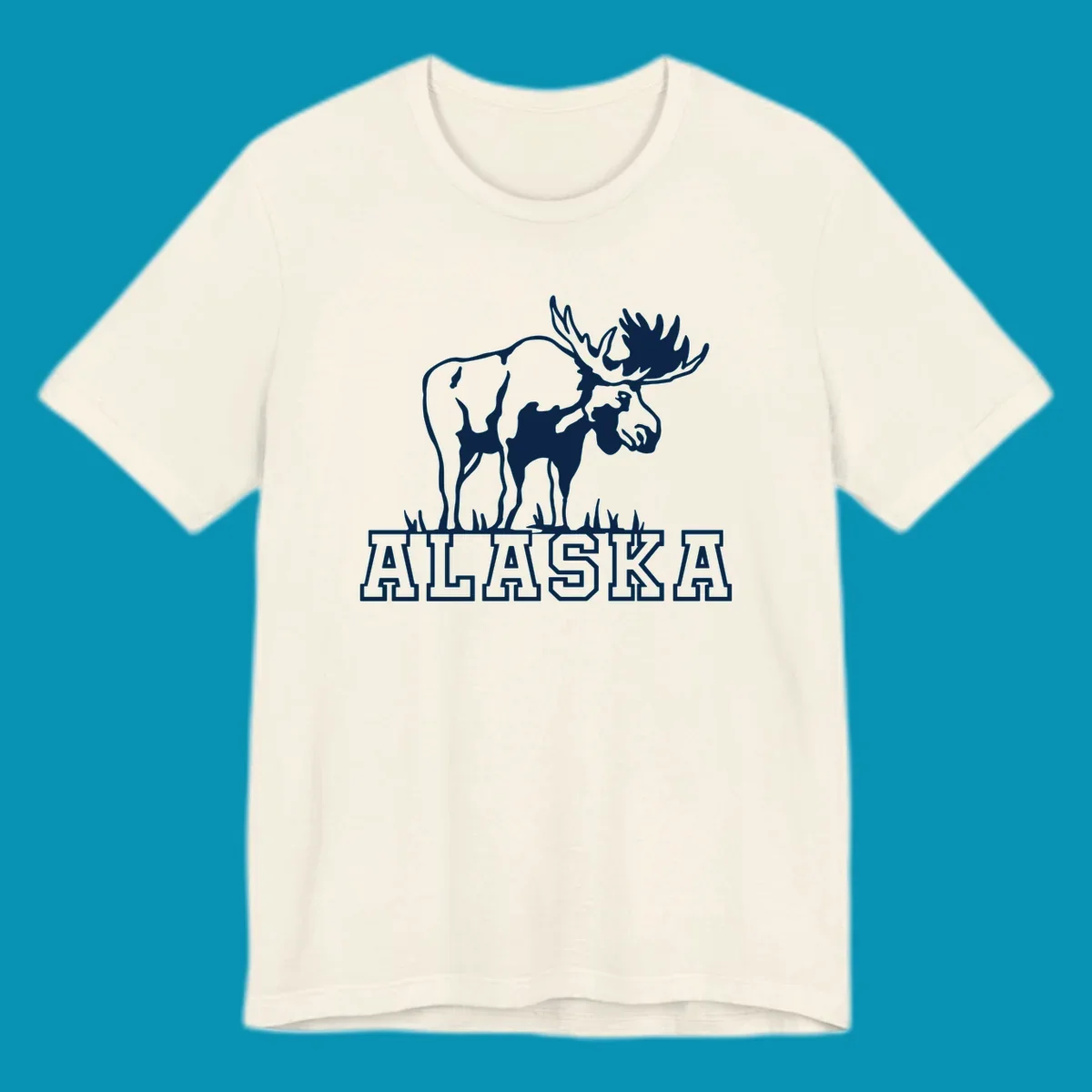White silhouette of a majestic moose with large antlers standing with grass below and ALASKA text, moose-alaska-silhouette design