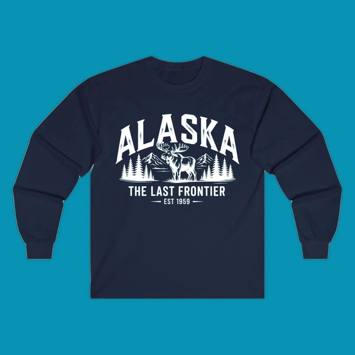 A white alaska-moose-frontier-scenic graphic showing a moose standing in front of mountains and pine trees.