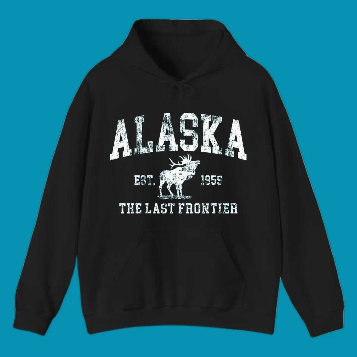 Distressed white design featuring a moose and the text ALASKA THE LAST FRONTIER.