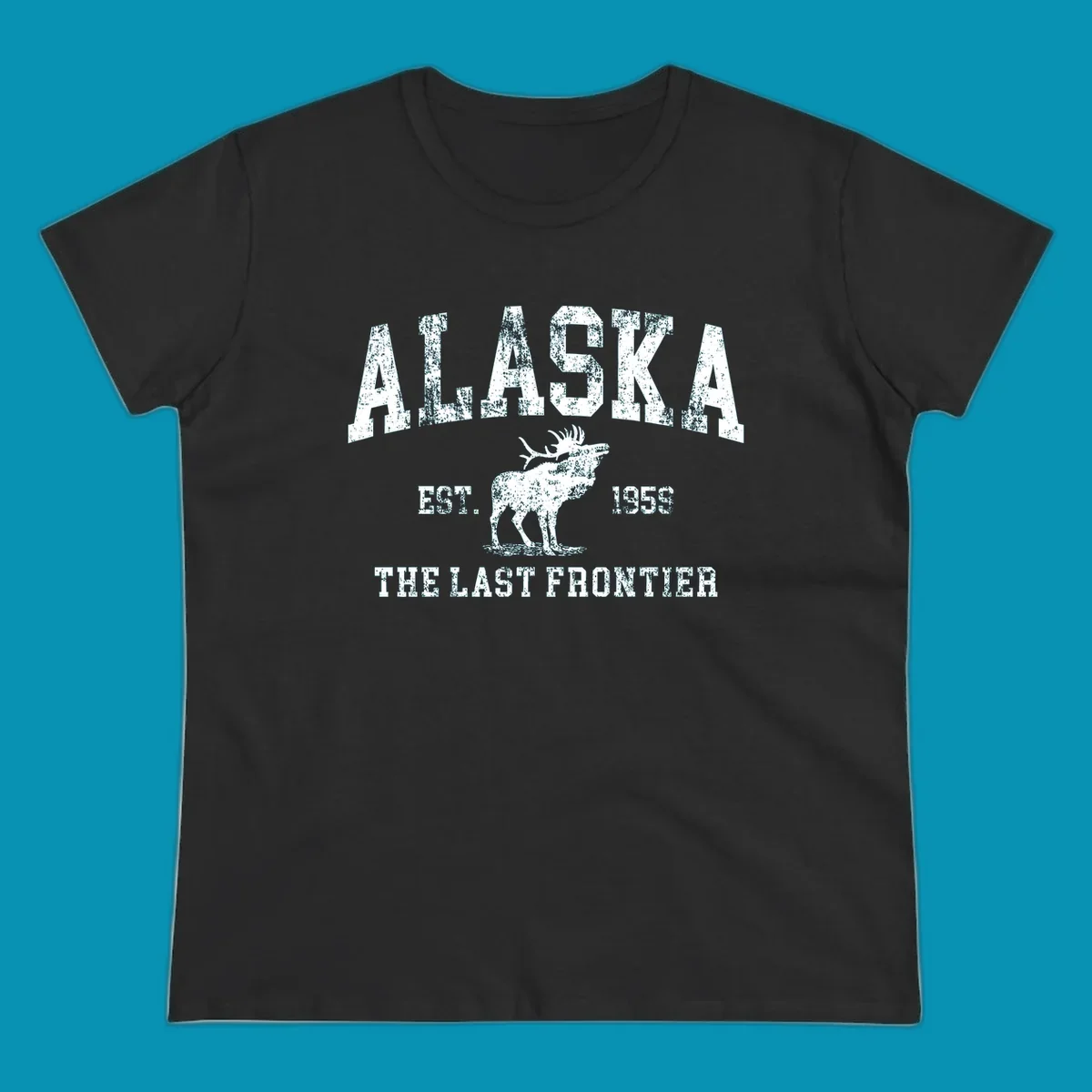 Distressed white design featuring a moose and the text ALASKA THE LAST FRONTIER.