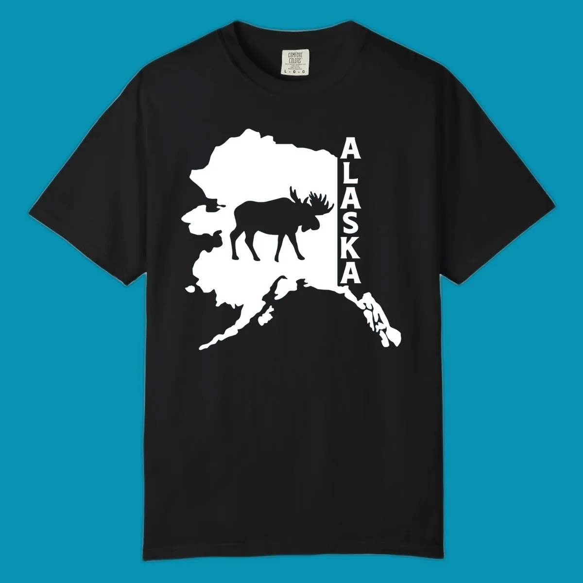 Bold white Alaska state map silhouette featuring a black moose and vertical ALASKA text.