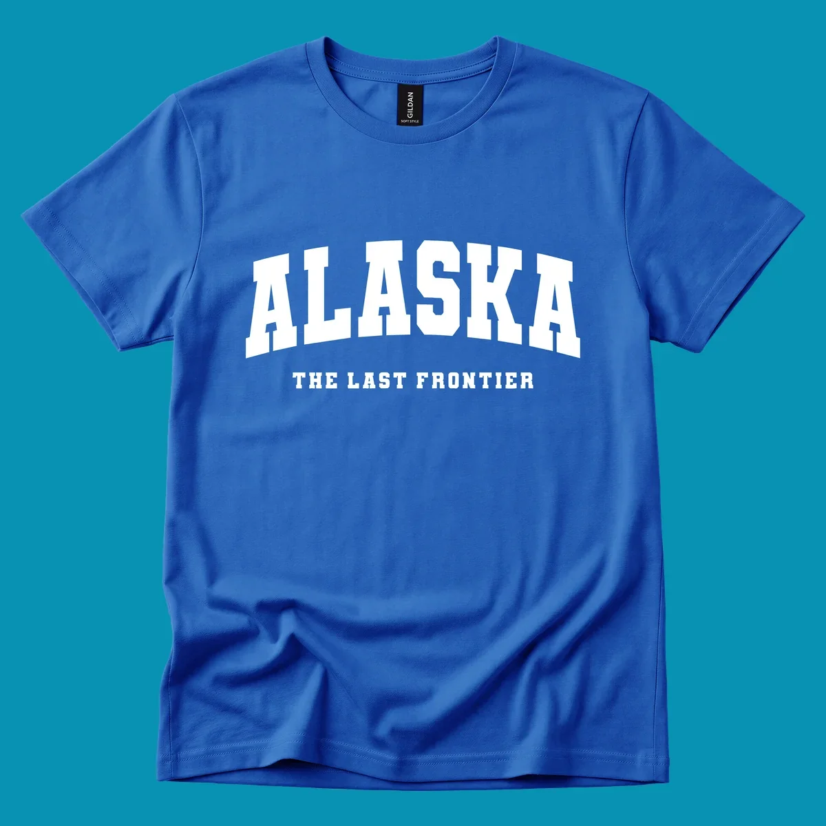 White block lettering on a black background reads 'ALASKA THE LAST FRONTIER', with 'ALASKA' larger. Design concept: alaska-last-frontier-typography.