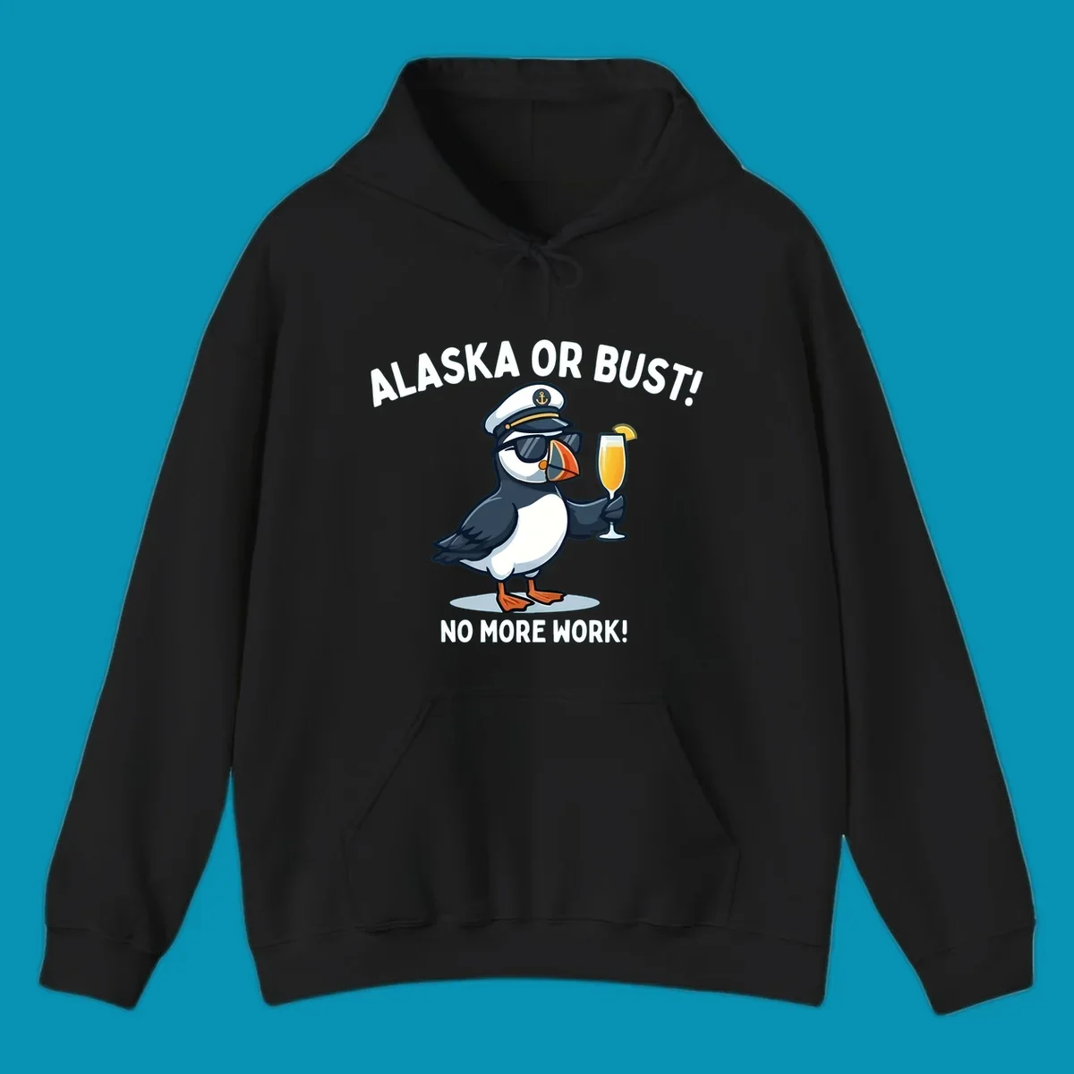 An illustrated puffin captain in sunglasses and a hat holds a cocktail with a lemon slice, with 'ALASKA OR BUST!' and 'NO MORE WORK!' text, representing the alaska-or-bust-captain-puffin concept.