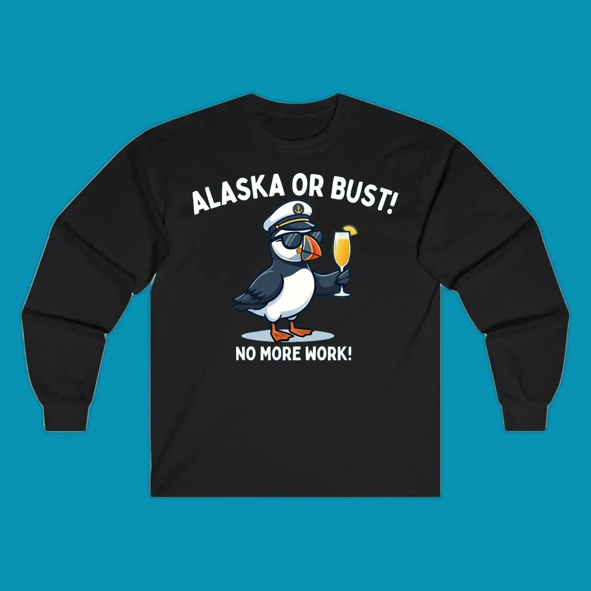 An illustrated puffin captain in sunglasses and a hat holds a cocktail with a lemon slice, with 'ALASKA OR BUST!' and 'NO MORE WORK!' text, representing the alaska-or-bust-captain-puffin concept.