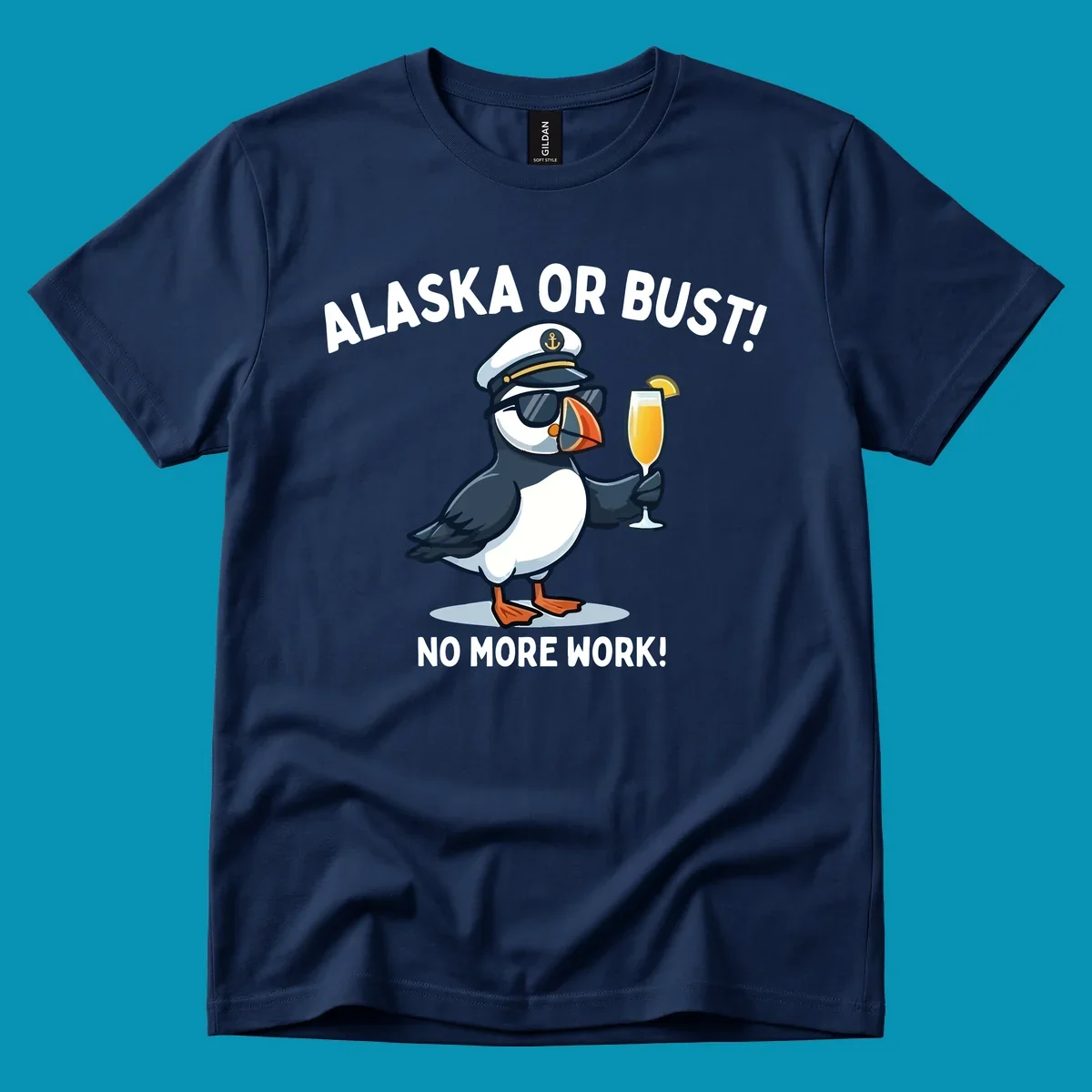 An illustrated puffin captain in sunglasses and a hat holds a cocktail with a lemon slice, with 'ALASKA OR BUST!' and 'NO MORE WORK!' text, representing the alaska-or-bust-captain-puffin concept.