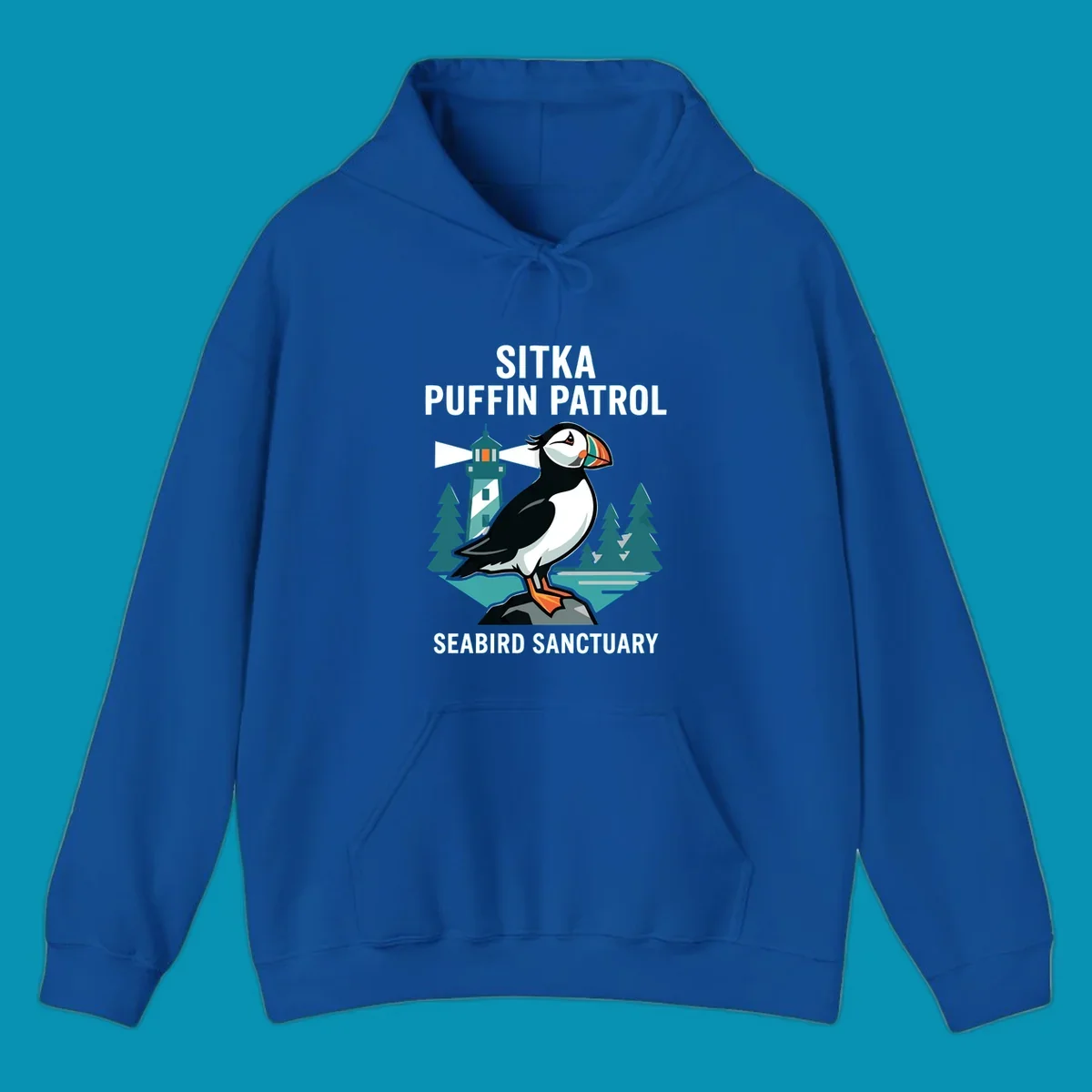 An illustration featuring a puffin on a rock with a lighthouse and pine trees in the background, with text 'SITKA PUFFIN PATROL SEABIRD SANCTUARY'. This design highlights the sitka-puffin-patrol theme.