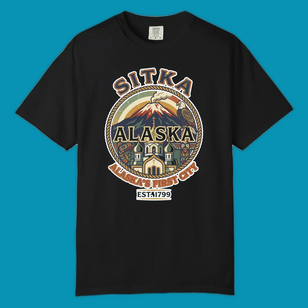 Vintage circular badge design for Sitka Alaska's First City, featuring snow-capped mountain, Russian Orthodox church, bald eagle, and totem pole, established 1799.
