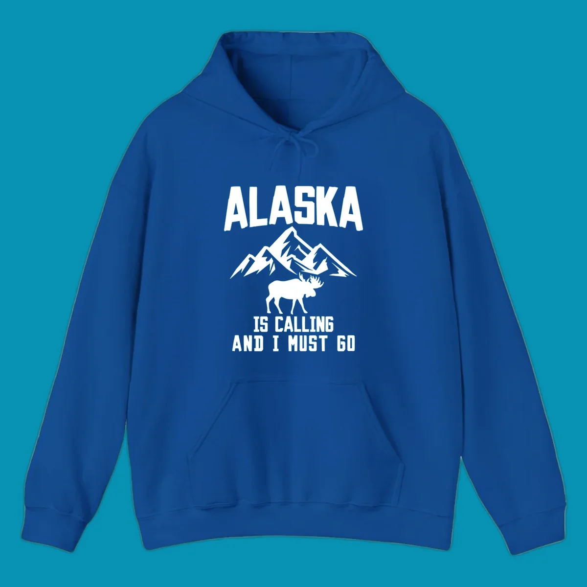 White moose silhouette and snow-capped mountains with text reading Alaska is calling and I must go