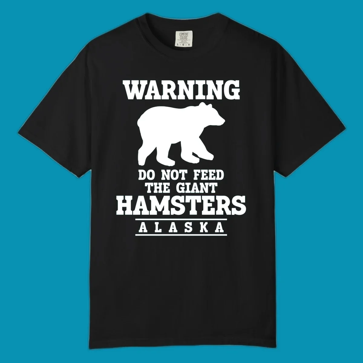 White bear silhouette with bold warning text reading 'Do Not Feed The Giant Hamsters Alaska' on gray background