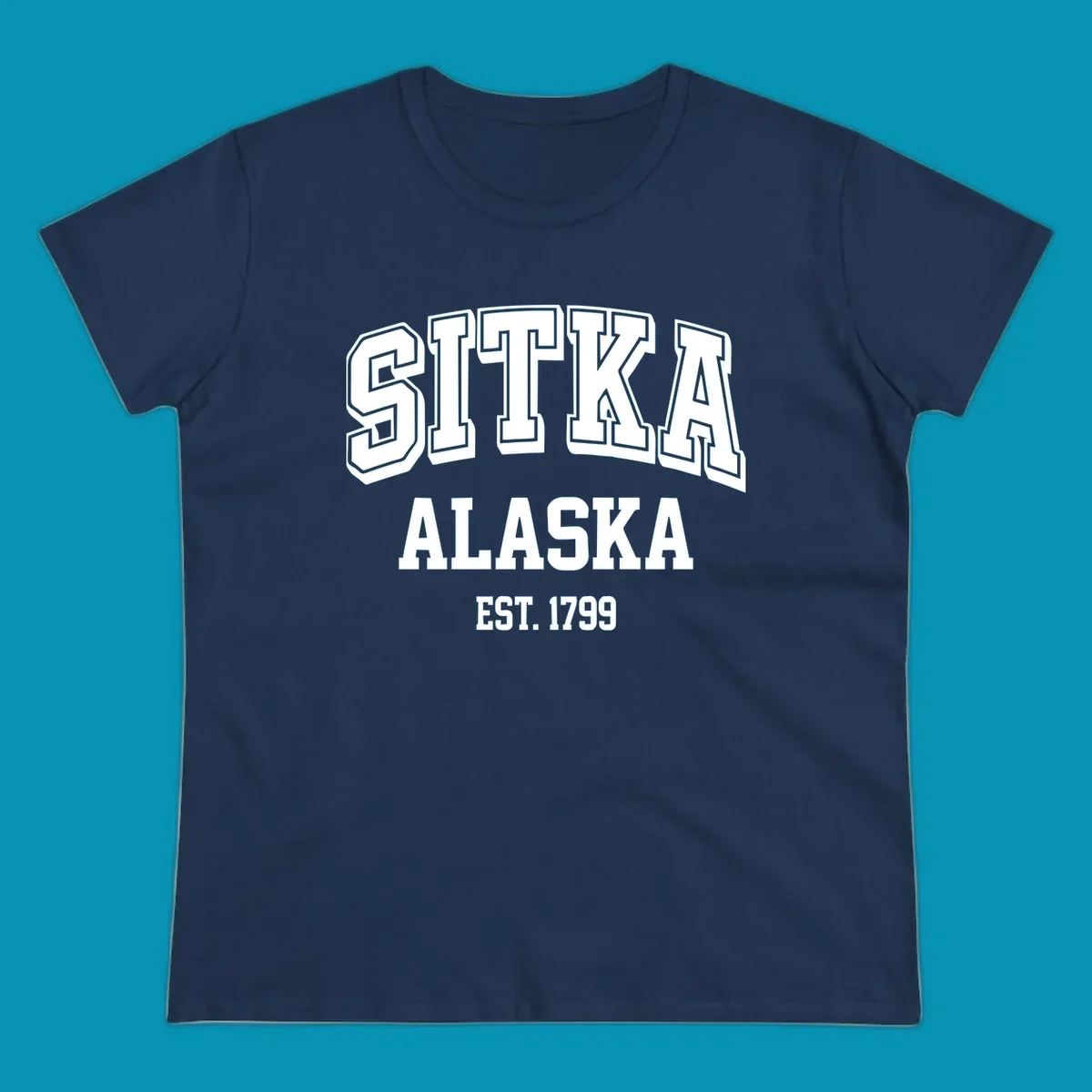 Vintage badge design reading Sitka Alaska Est. 1799 in bold outlined and solid white lettering on gray background