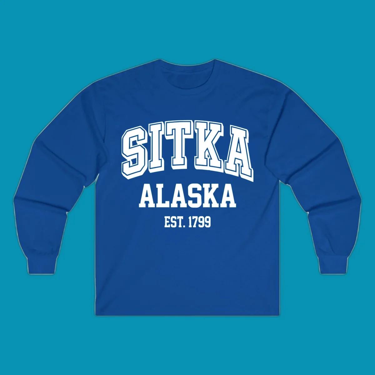Vintage badge design reading Sitka Alaska Est. 1799 in bold outlined and solid white lettering on gray background