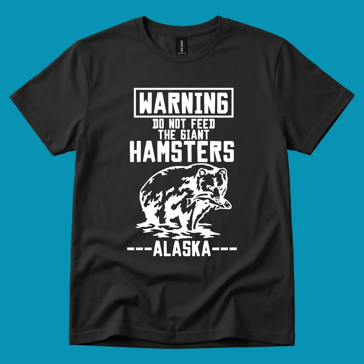 Warning-style design with giant hamster illustration and text reading 'Do Not Feed The Giant Hamsters Alaska' in white lettering on gray background
